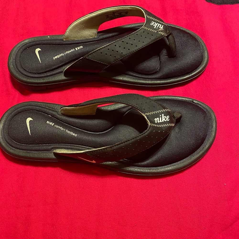 Lightly worn once. Nike slides